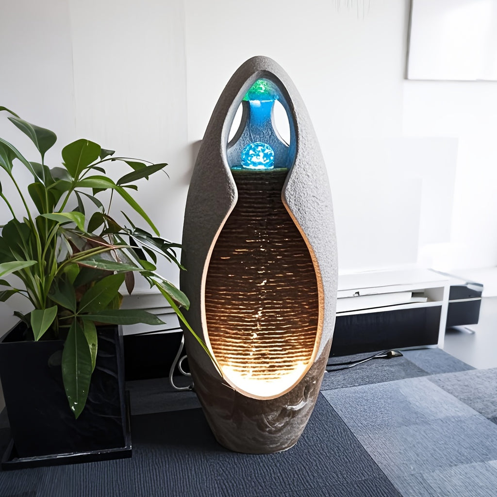 An Indoor Floor Fountain, Standing 27.55 Inches Tall. It's A Home Decor Item, A Large Cobblestone Floor Fountain Ornament, Complete with A Glass Ball And Lighting Features.