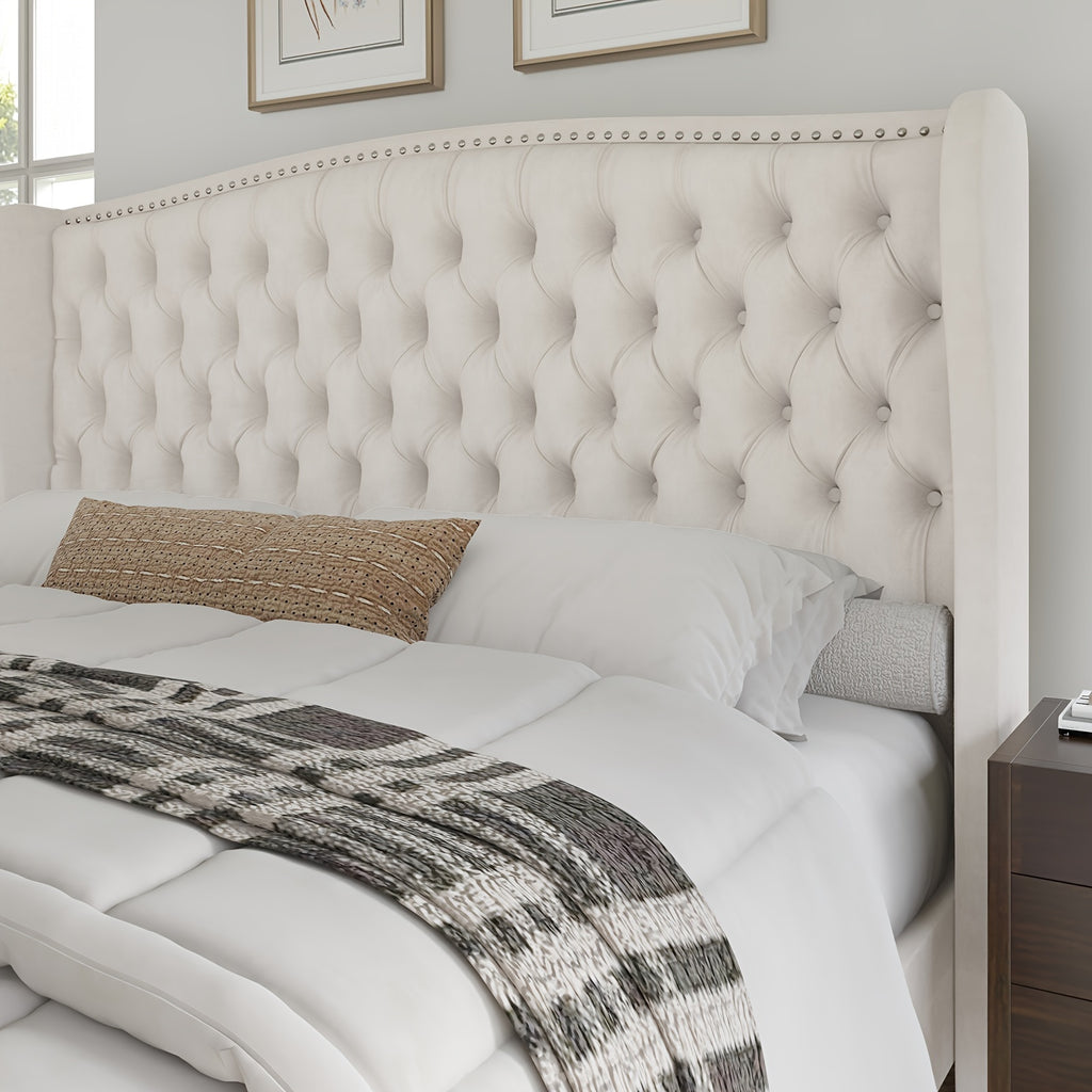 Handcrafted Velvet Bed Frame Featuring a Wingback Headboard, Adorned with Button Tufting And Nailhead Accents, Supported by Wooden Slats.