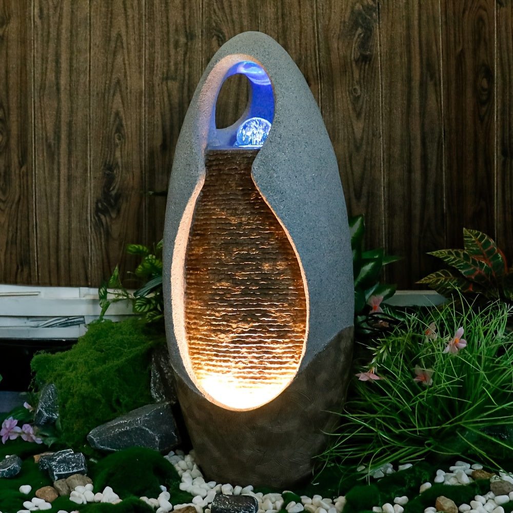 An Indoor Floor Fountain, Standing 27.55 Inches Tall. It's A Home Decor Item, A Large Cobblestone Floor Fountain Ornament, Complete with A Glass Ball And Lighting Features.