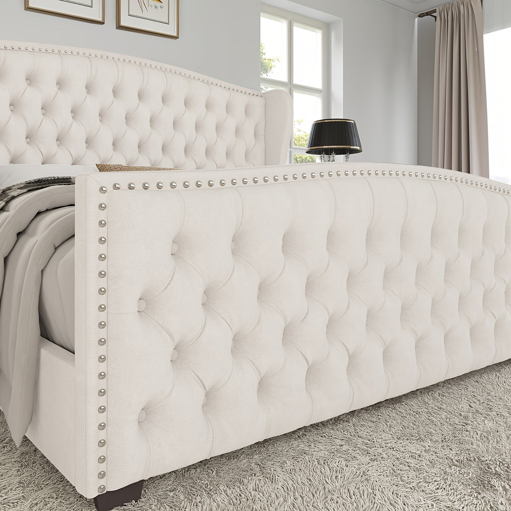 Handcrafted Velvet Bed Frame Featuring a Wingback Headboard, Adorned with Button Tufting And Nailhead Accents, Supported by Wooden Slats.
