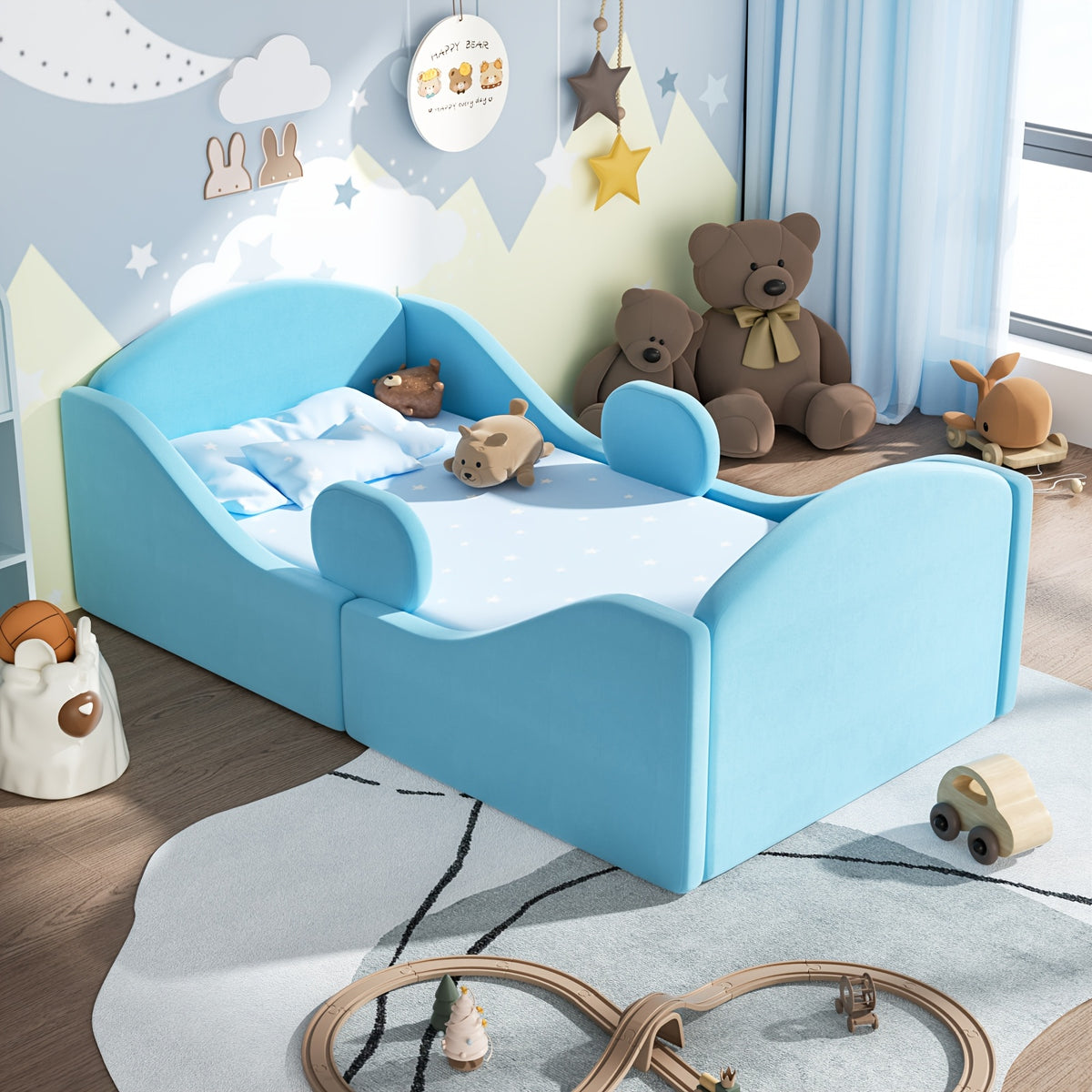 Bed Designed for Toddlers, Featuring Removable Safety Rails And a Soft Upholstered End in Pink, Blue, Or Gray. Note: Mattress Is Not Included