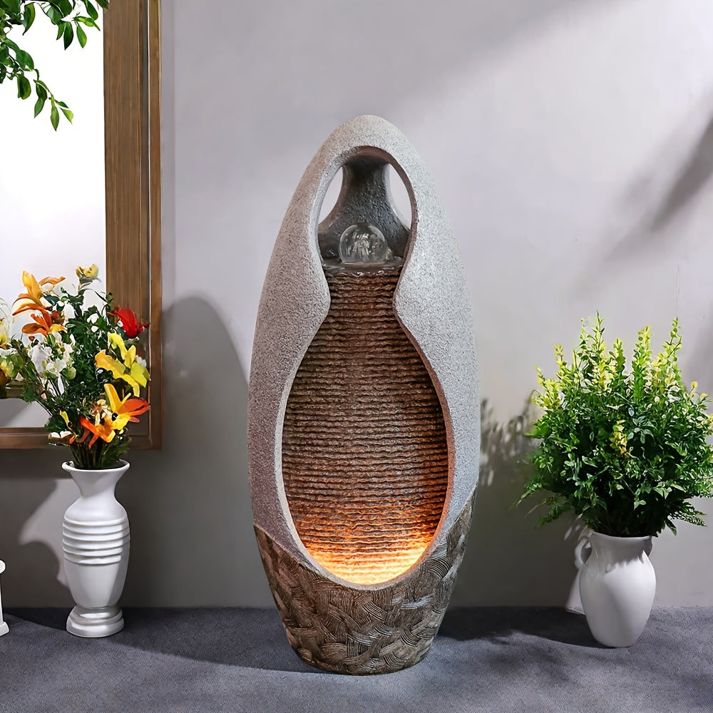 An Indoor Floor Fountain, Standing 27.55 Inches Tall. It's A Home Decor Item, A Large Cobblestone Floor Fountain Ornament, Complete with A Glass Ball And Lighting Features.