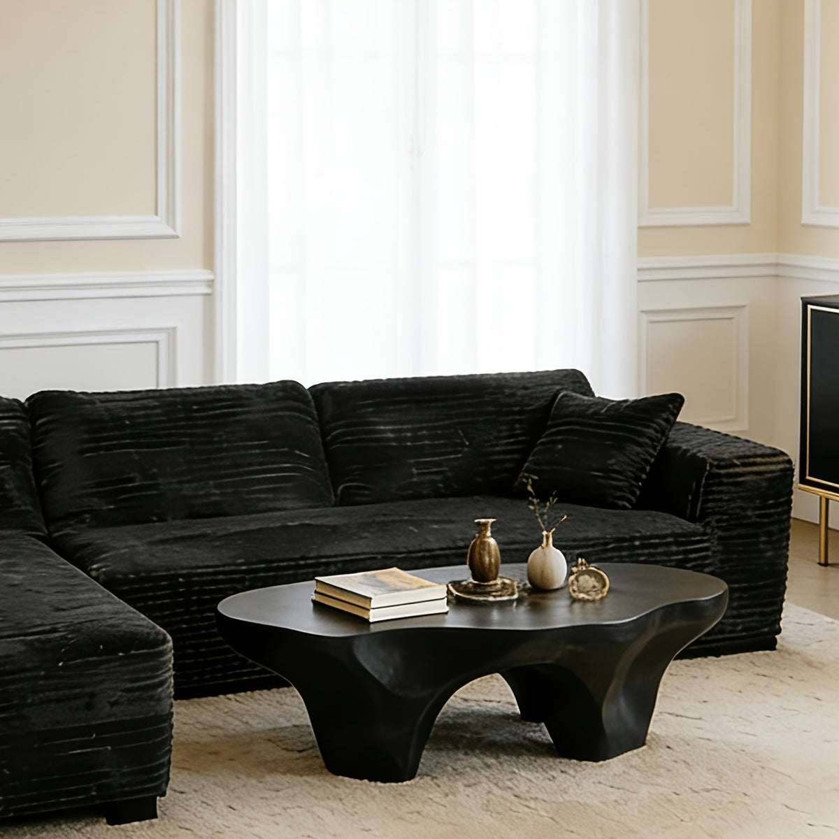 Elegant Contemporary Living Room Setup: Soft Ribbed Fabric Corner Sofa, Light-Filled Interior, And Curated Tabletop Greenery