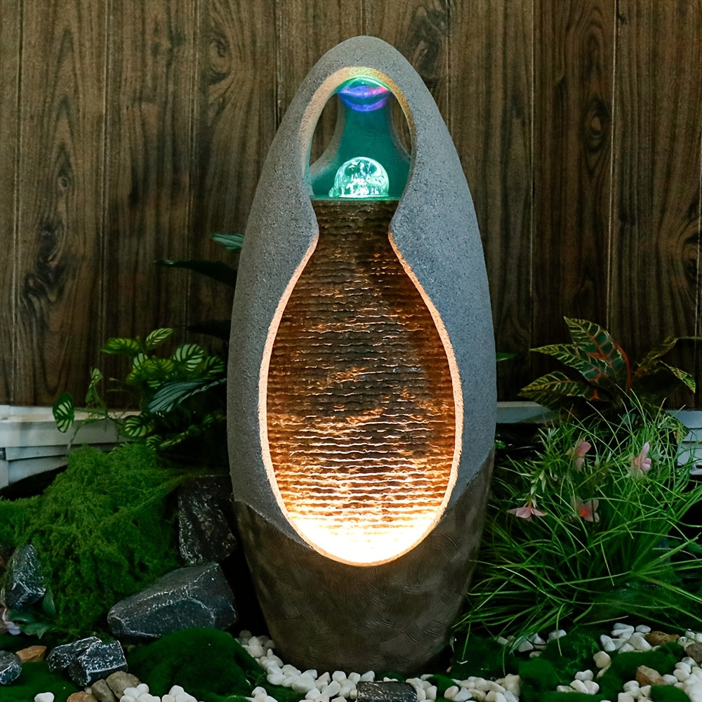 An Indoor Floor Fountain, Standing 27.55 Inches Tall. It's A Home Decor Item, A Large Cobblestone Floor Fountain Ornament, Complete with A Glass Ball And Lighting Features.